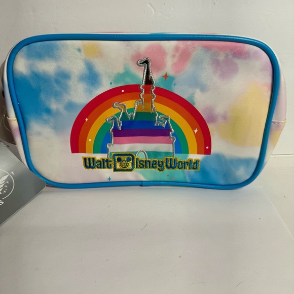 Disney Handbags - NWT. Disney Pride Collection crossbody hip fanny pack featuring a rainbow strap.